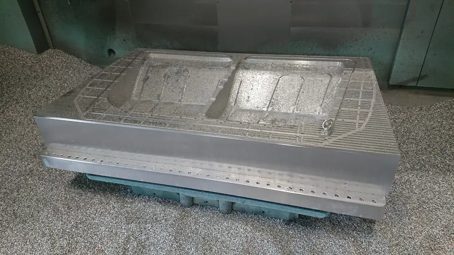 Large mould block being machined on CNC at Shape AS